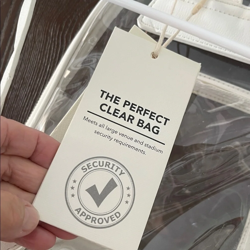 Madison West clear bag for places that require a see through bag. NWT